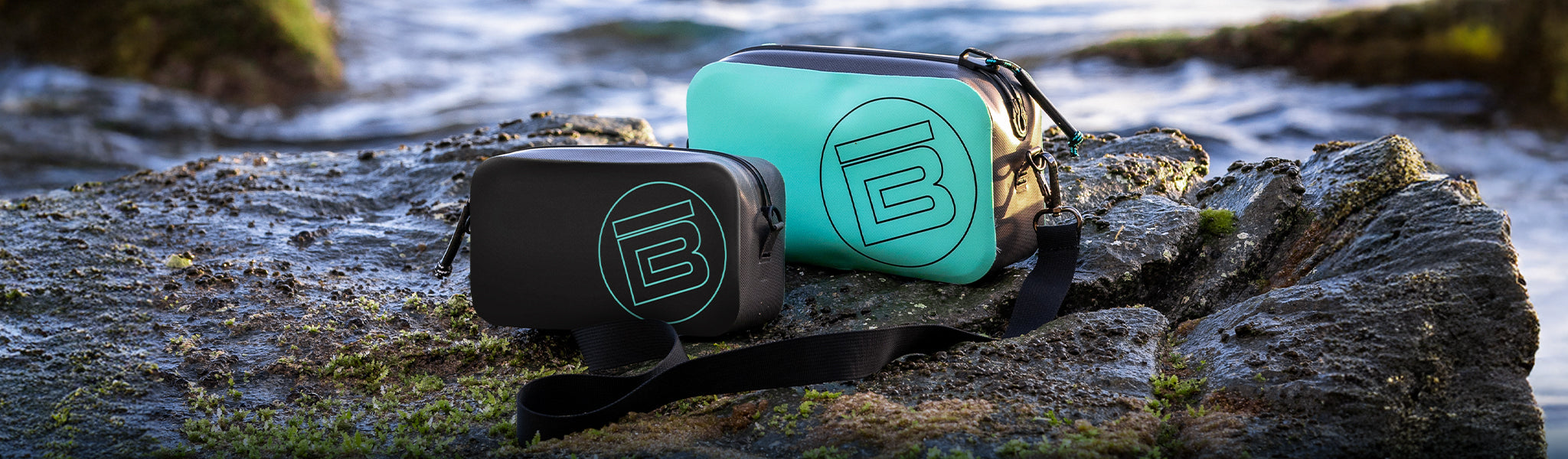The Hitchhiker Standard and XL size packs sitting on a rock