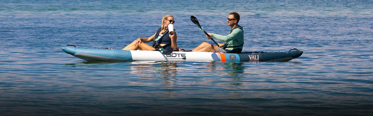 Man and woman on a BOTE Zeppelin Aero Inflatable Kayak