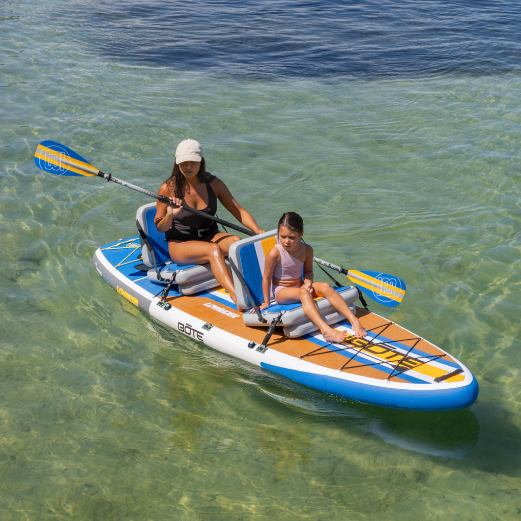 Woman and child seated kayaking together on a LowRider Aero Tandem.