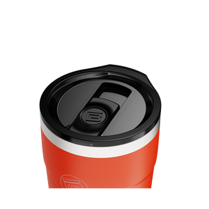 Angled top view of the MAGNETumbler 20oz Replacement Lid attached to an orange tumbler.