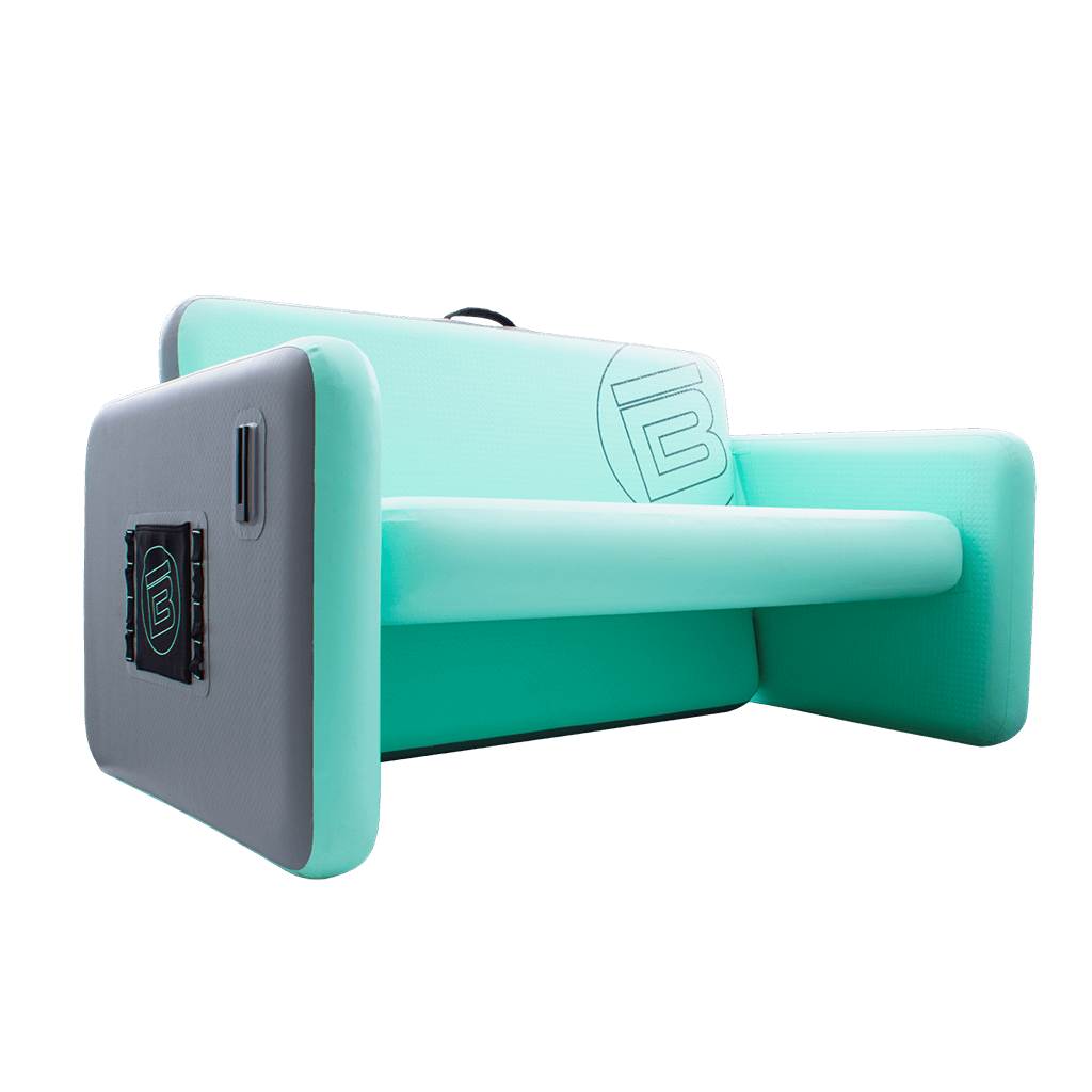 Angled view of the Aero Couch with stretch pocket and MOLLE loops on the side with cup holder receiver