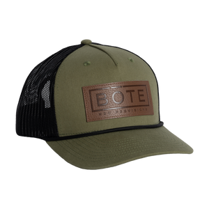Front view of the BOTE Boxed Logo Hat with brown Patch in dark green.