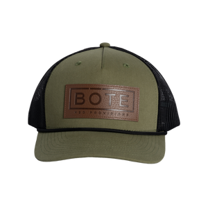 Front view of the BOTE Boxed Logo Hat with brown Patch in dark green.
