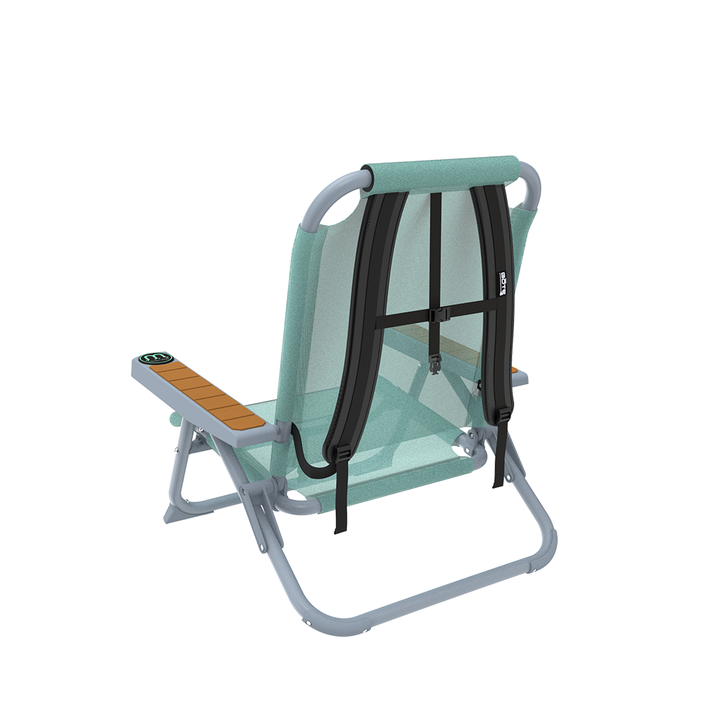 Rear angled view of Mule Dune Chair showing backpack straps and mint mesh backrest.