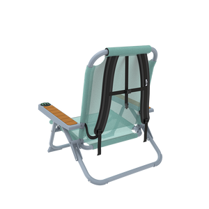 Rear angled view of Mule Dune Chair showing backpack straps and mint mesh backrest.