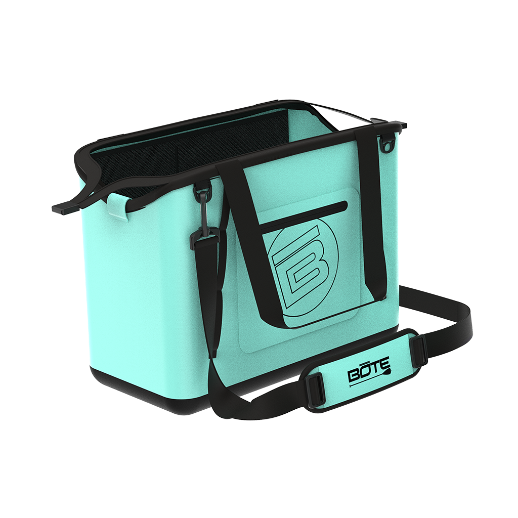 Angled front view of Mule Tote in mint with black handles, strap, and exterior pocket.