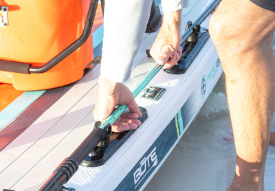 Close-up view of ProRider Aero rail system with fishing rod and cooler.