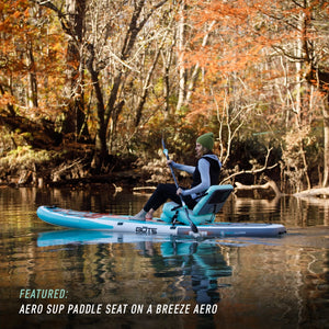 Woman paddling on an Aero SUP Paddle Seat on a Breeze Aero