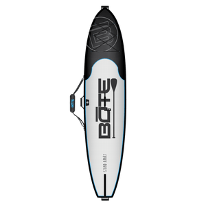Front of a board bag including extra strap to hold paddle