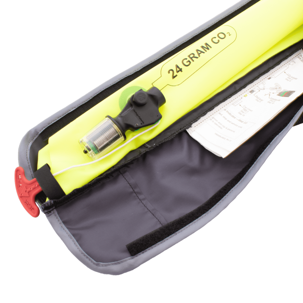 Closeup of where the CO2 cylinder is connected to the BOTE Inflatable Vest PFD