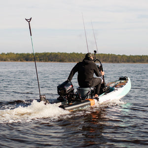 Man using a 6hp Hidea Outboard motor to power his Rover Aero Micro Skiff